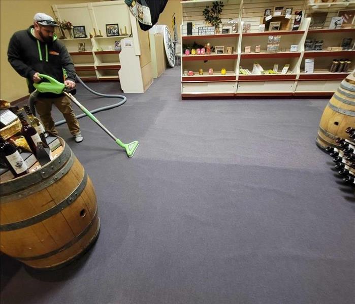 technician drying a floor